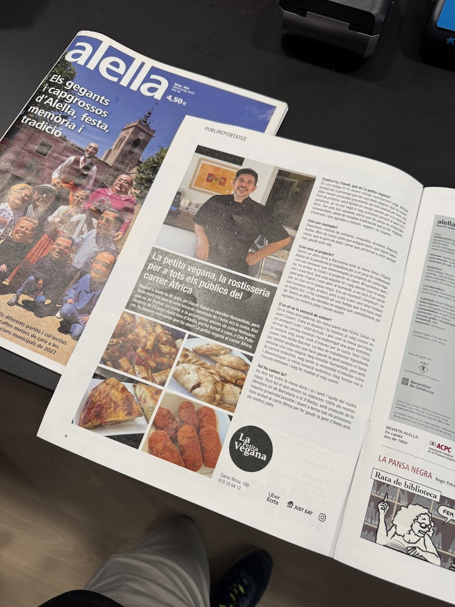 Photograph of Alella magazine issue 403 open to its advertorial about La Petita Vegana